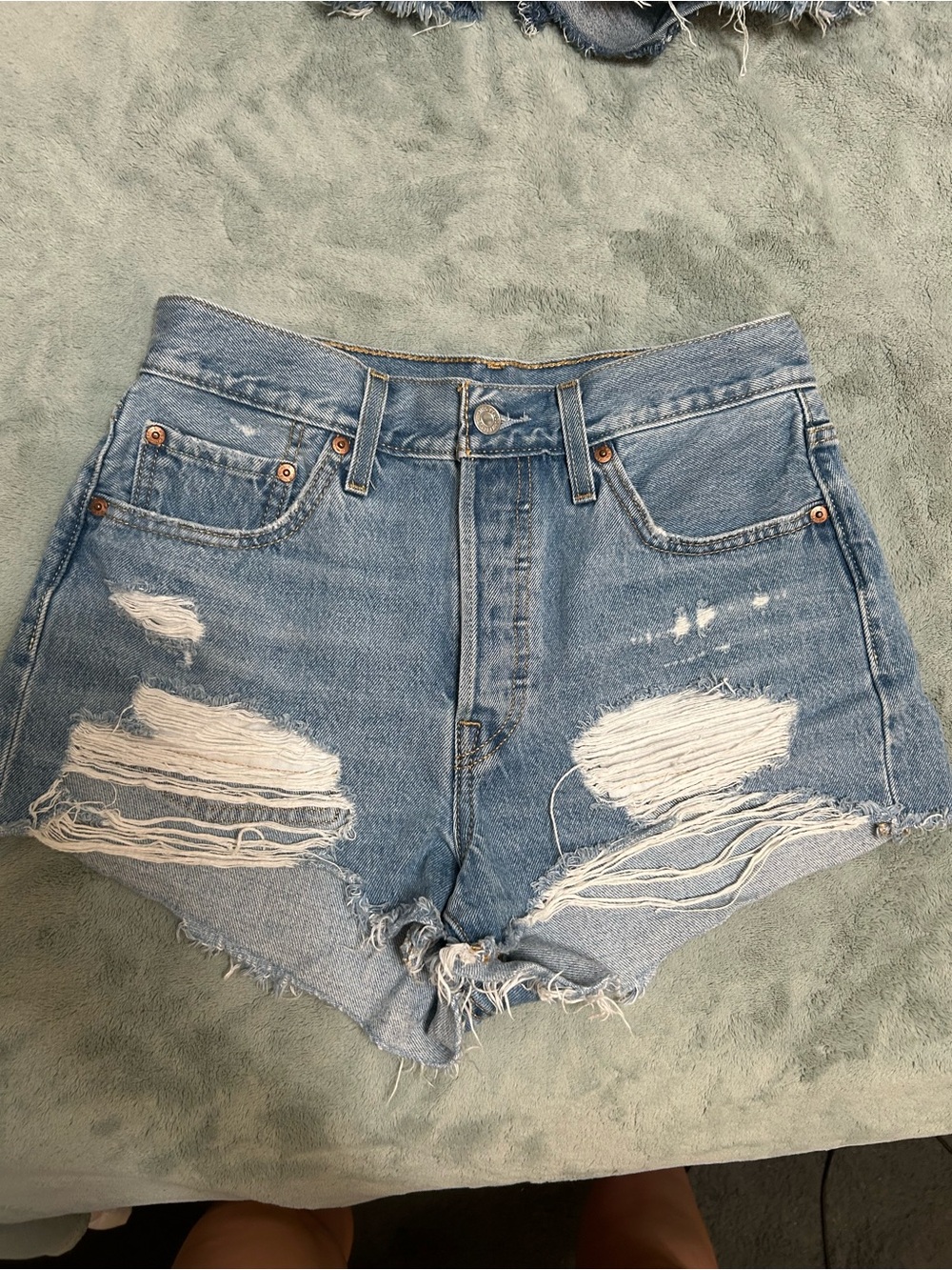 High-Rise Light Blue Distressed Denim Shorts